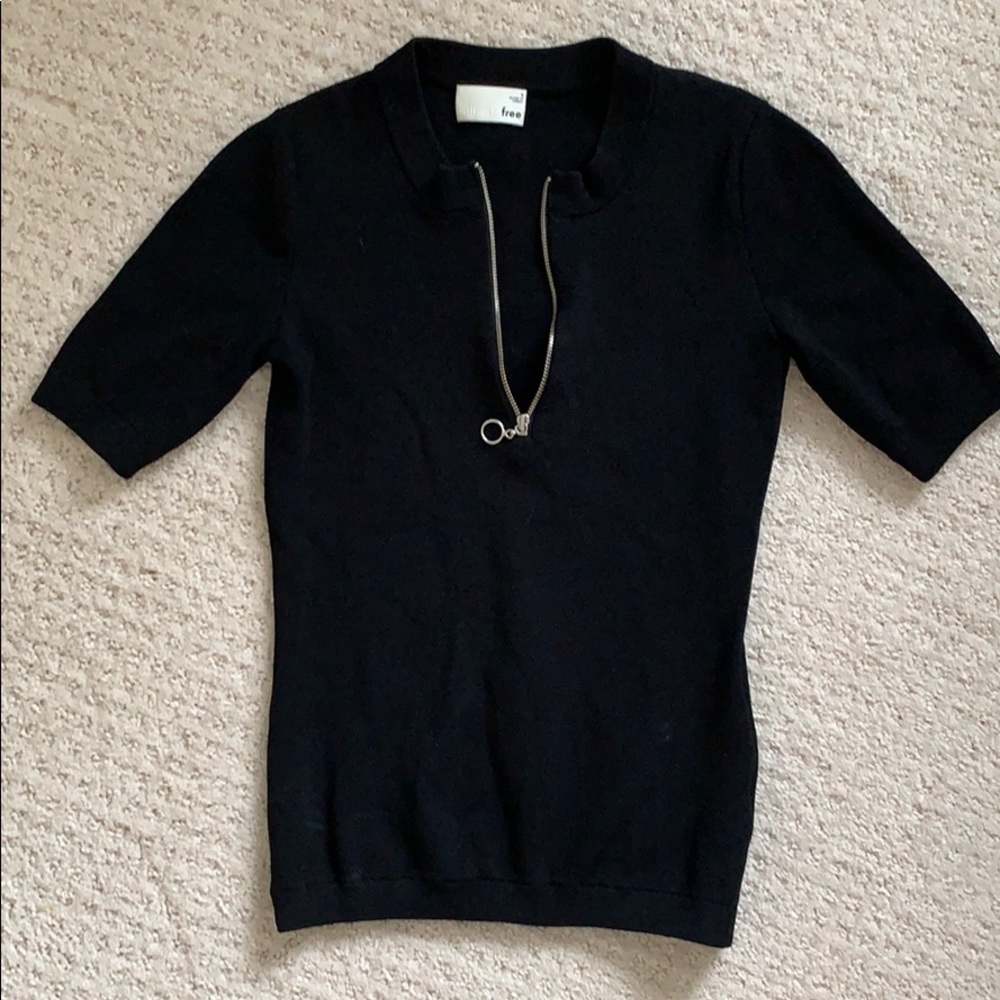 Black short sleeved zipper top